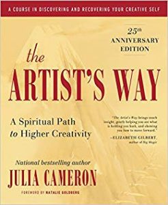 A book cover with the words " the artist 's way ".